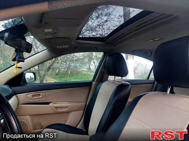 Серый Мазда 3, объемом двигателя 1.6 л и пробегом 219 тыс. км за 5800 $, фото 5 на Automoto.ua