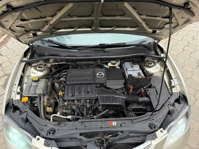 Серый Мазда 3, объемом двигателя 1.6 л и пробегом 170 тыс. км за 6000 $, фото 19 на Automoto.ua