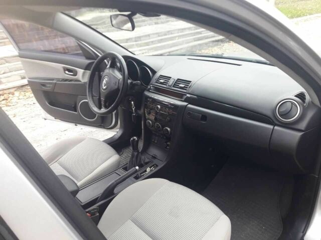 Серый Мазда 3, объемом двигателя 1.6 л и пробегом 204 тыс. км за 5450 $, фото 6 на Automoto.ua