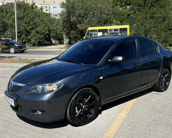 Серый Мазда 3, объемом двигателя 1.6 л и пробегом 246 тыс. км за 6400 $, фото 2 на Automoto.ua