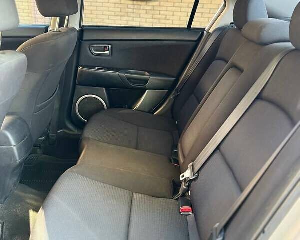 Серый Мазда 3, объемом двигателя 1.6 л и пробегом 270 тыс. км за 5950 $, фото 13 на Automoto.ua
