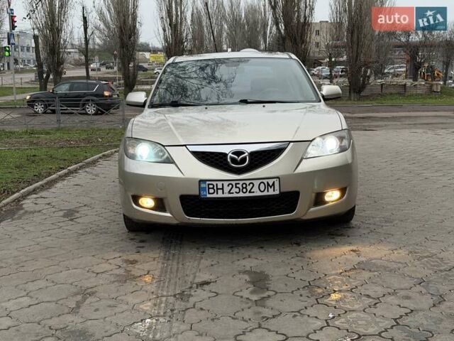 Серый Мазда 3, объемом двигателя 1.6 л и пробегом 170 тыс. км за 6000 $, фото 1 на Automoto.ua