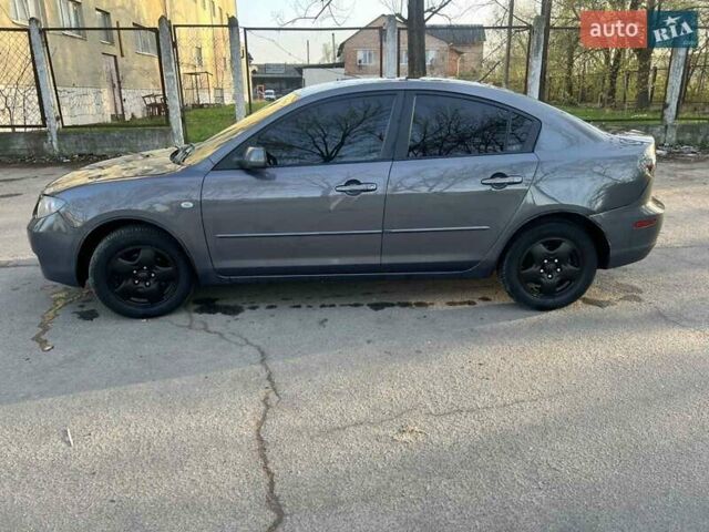 Мазда 3 2008 в Змиеве на Automoto.ua Серый Мазда 3, объемом двигателя 2 л и пробегом 290 тыс. км за 5700 $, фото 9 на Automoto.ua