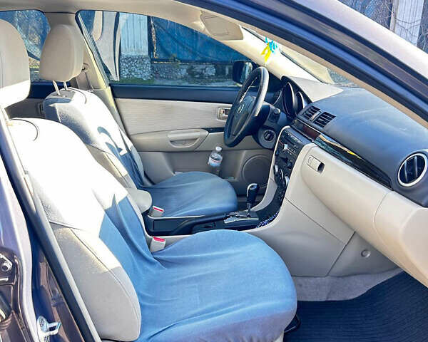 Серый Мазда 3, объемом двигателя 1.6 л и пробегом 89 тыс. км за 7500 $, фото 1 на Automoto.ua