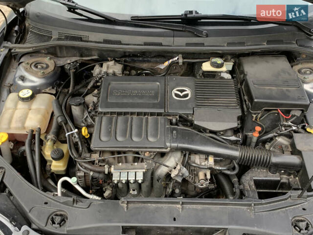 Сірий Мазда 3, об'ємом двигуна 1.6 л та пробігом 228 тис. км за 6100 $, фото 10 на Automoto.ua