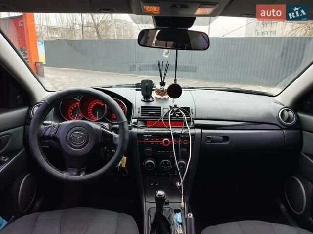 Серый Мазда 3, объемом двигателя 2 л и пробегом 157 тыс. км за 6050 $, фото 3 на Automoto.ua