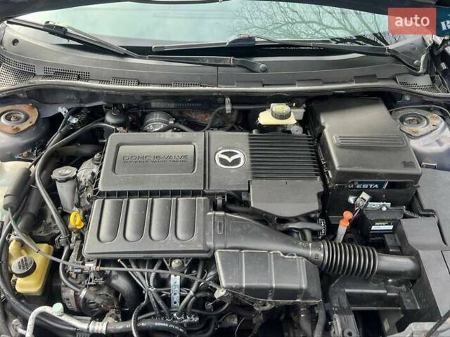 Серый Мазда 3, объемом двигателя 1.6 л и пробегом 178 тыс. км за 6250 $, фото 24 на Automoto.ua