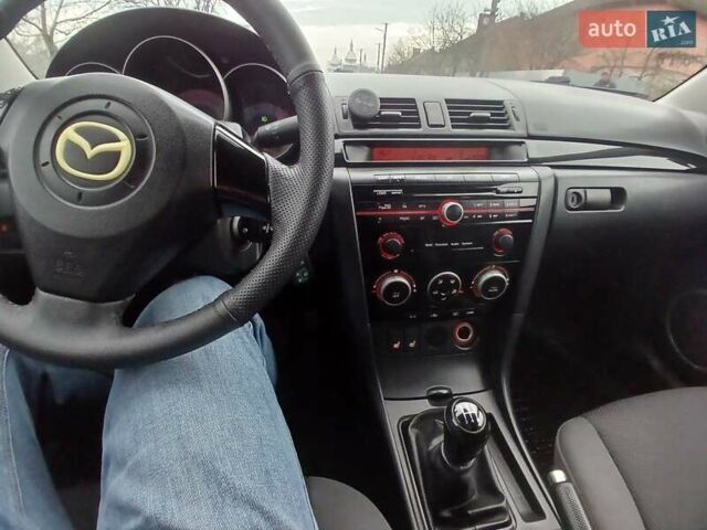 Серый Мазда 3, объемом двигателя 1.6 л и пробегом 223 тыс. км за 5600 $, фото 4 на Automoto.ua