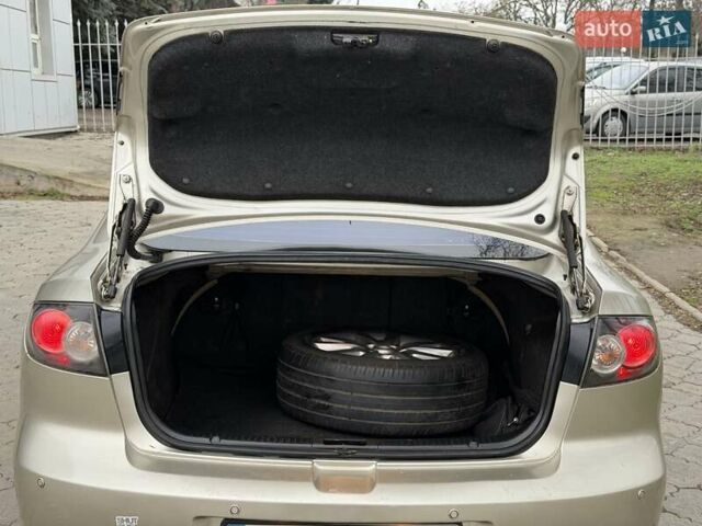 Серый Мазда 3, объемом двигателя 1.6 л и пробегом 170 тыс. км за 6000 $, фото 18 на Automoto.ua