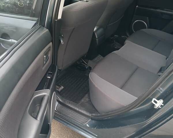 Серый Мазда 3, объемом двигателя 1.6 л и пробегом 223 тыс. км за 5600 $, фото 6 на Automoto.ua