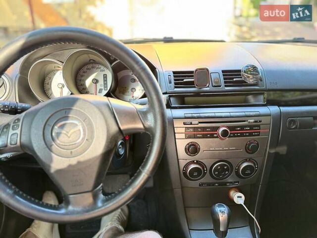 Серый Мазда 3, объемом двигателя 1.6 л и пробегом 270 тыс. км за 5950 $, фото 16 на Automoto.ua