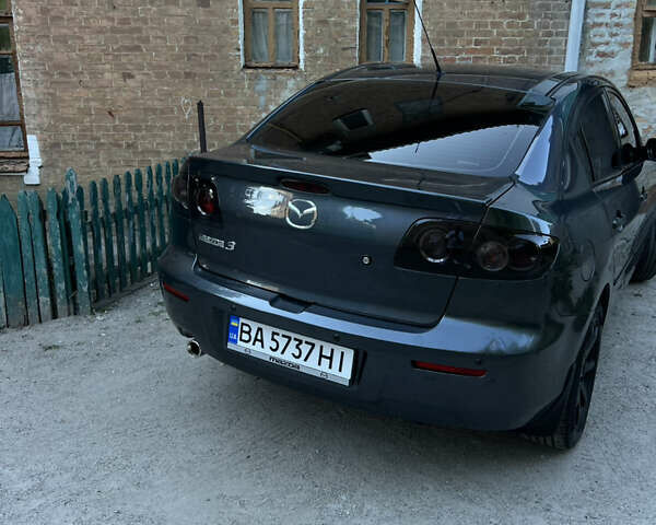 Серый Мазда 3, объемом двигателя 1.6 л и пробегом 246 тыс. км за 6400 $, фото 6 на Automoto.ua