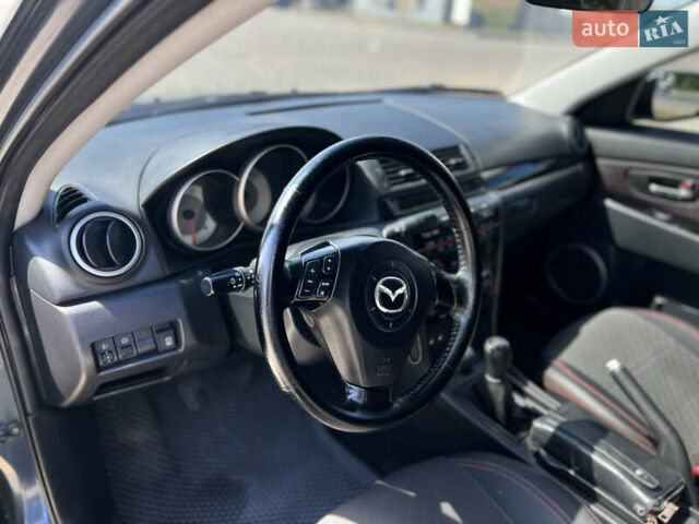 Серый Мазда 3, объемом двигателя 1.6 л и пробегом 246 тыс. км за 6400 $, фото 7 на Automoto.ua