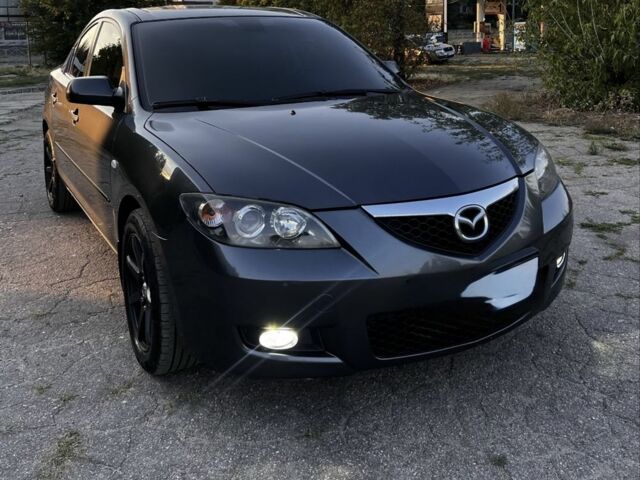 Серый Мазда 3, объемом двигателя 1.6 л и пробегом 140 тыс. км за 777 $, фото 2 на Automoto.ua