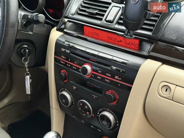 Серый Мазда 3, объемом двигателя 1.6 л и пробегом 170 тыс. км за 6000 $, фото 16 на Automoto.ua