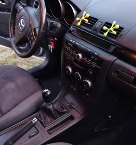 Серый Мазда 3, объемом двигателя 1.6 л и пробегом 282 тыс. км за 5100 $, фото 5 на Automoto.ua