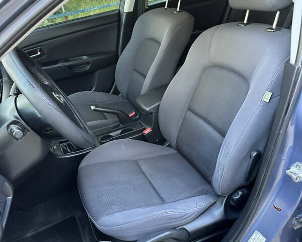 Серый Мазда 3, объемом двигателя 1.6 л и пробегом 198 тыс. км за 5500 $, фото 11 на Automoto.ua