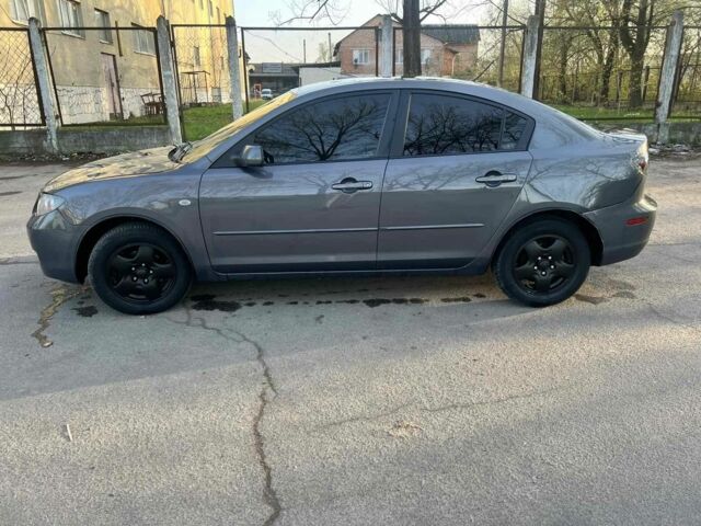 Серый Мазда 3, объемом двигателя 2 л и пробегом 290 тыс. км за 5700 $, фото 6 на Automoto.ua