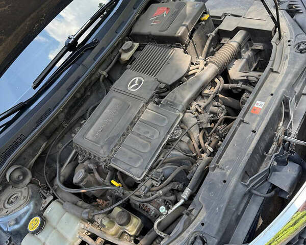 Серый Мазда 3, объемом двигателя 1.6 л и пробегом 246 тыс. км за 6500 $, фото 8 на Automoto.ua