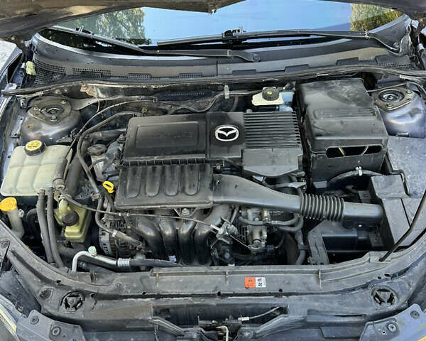 Серый Мазда 3, объемом двигателя 1.6 л и пробегом 198 тыс. км за 5500 $, фото 12 на Automoto.ua