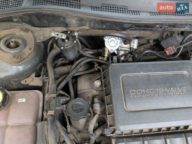 Серый Мазда 3, объемом двигателя 1.6 л и пробегом 156 тыс. км за 5700 $, фото 4 на Automoto.ua