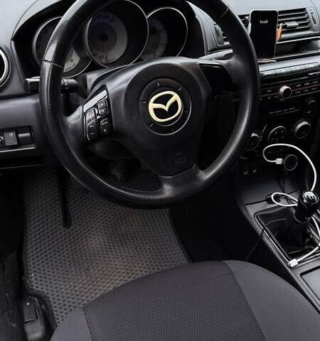 Серый Мазда 3, объемом двигателя 1.6 л и пробегом 228 тыс. км за 5600 $, фото 7 на Automoto.ua