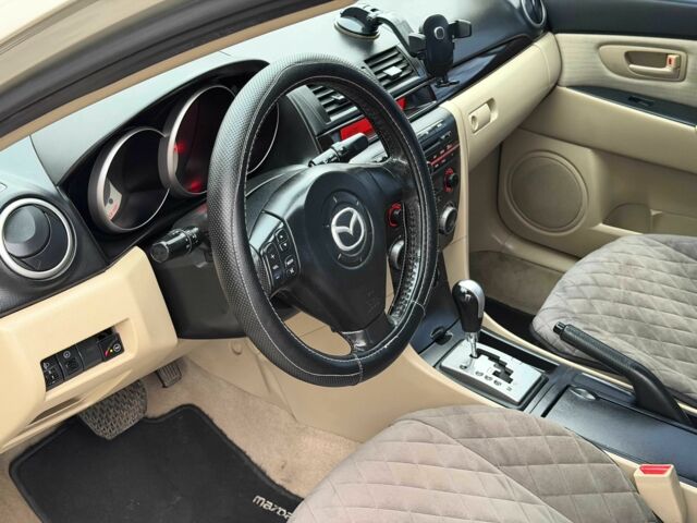 Серый Мазда 3, объемом двигателя 1.6 л и пробегом 170 тыс. км за 6000 $, фото 8 на Automoto.ua