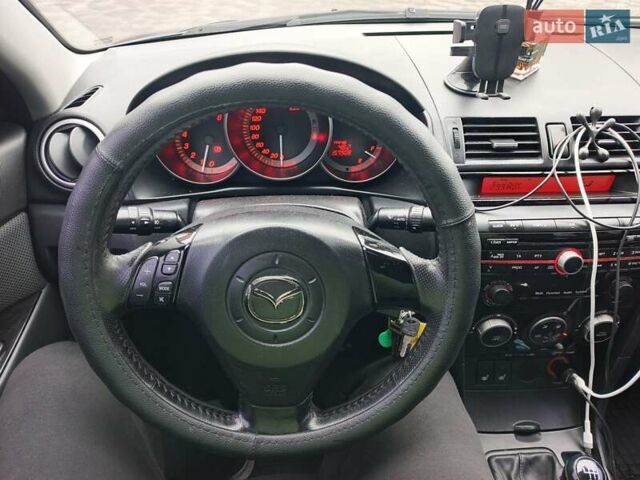 Серый Мазда 3, объемом двигателя 2 л и пробегом 157 тыс. км за 6050 $, фото 5 на Automoto.ua
