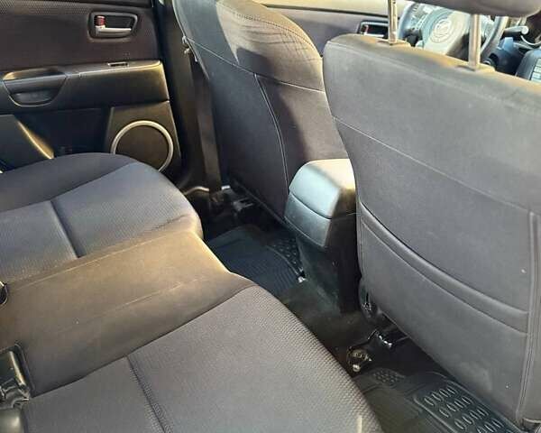 Серый Мазда 3, объемом двигателя 1.6 л и пробегом 270 тыс. км за 5950 $, фото 10 на Automoto.ua