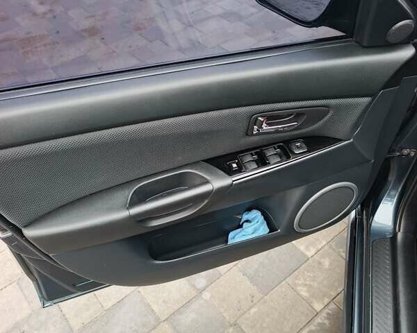 Серый Мазда 3, объемом двигателя 2 л и пробегом 157 тыс. км за 6050 $, фото 4 на Automoto.ua