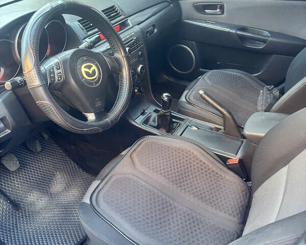 Серый Мазда 3, объемом двигателя 2 л и пробегом 162 тыс. км за 5200 $, фото 11 на Automoto.ua