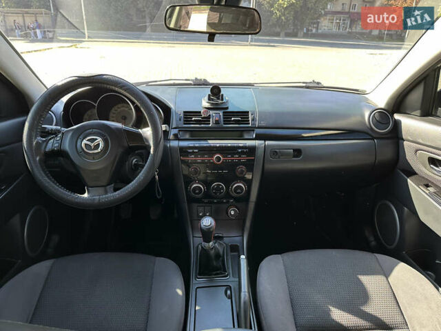 Серый Мазда 3, объемом двигателя 1.6 л и пробегом 198 тыс. км за 5500 $, фото 4 на Automoto.ua