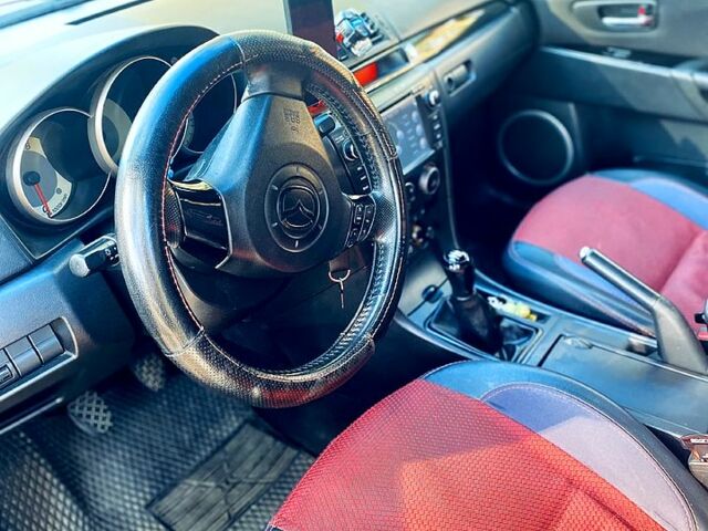 Серый Мазда 3, объемом двигателя 1.6 л и пробегом 249 тыс. км за 4700 $, фото 8 на Automoto.ua