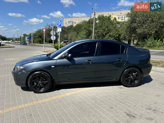 Серый Мазда 3, объемом двигателя 1.6 л и пробегом 246 тыс. км за 6400 $, фото 8 на Automoto.ua