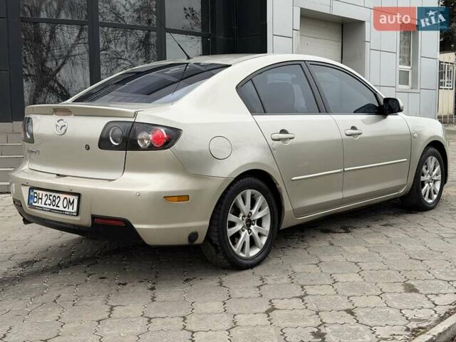 Серый Мазда 3, объемом двигателя 1.6 л и пробегом 170 тыс. км за 6000 $, фото 3 на Automoto.ua