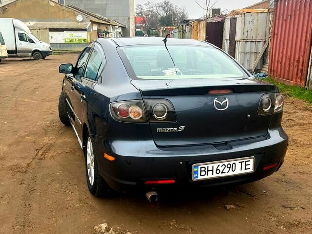 Серый Мазда 3, объемом двигателя 1.6 л и пробегом 219 тыс. км за 5800 $, фото 1 на Automoto.ua