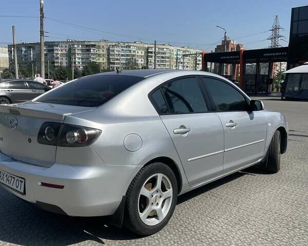 Серый Мазда 3, объемом двигателя 1.6 л и пробегом 250 тыс. км за 5800 $, фото 2 на Automoto.ua