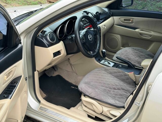 Серый Мазда 3, объемом двигателя 1.6 л и пробегом 170 тыс. км за 6000 $, фото 7 на Automoto.ua