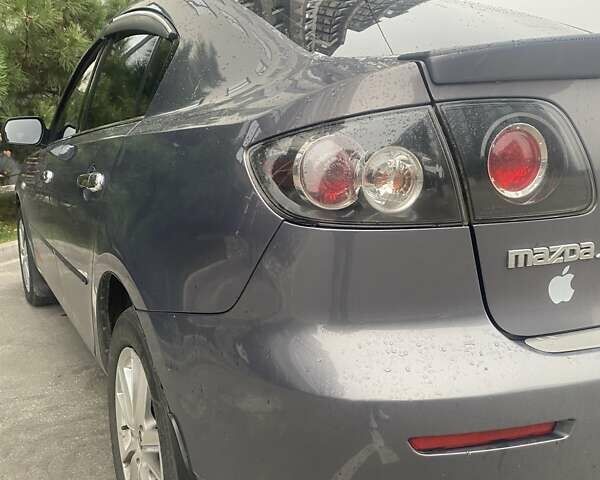 Серый Мазда 3, объемом двигателя 1.6 л и пробегом 228 тыс. км за 5600 $, фото 14 на Automoto.ua