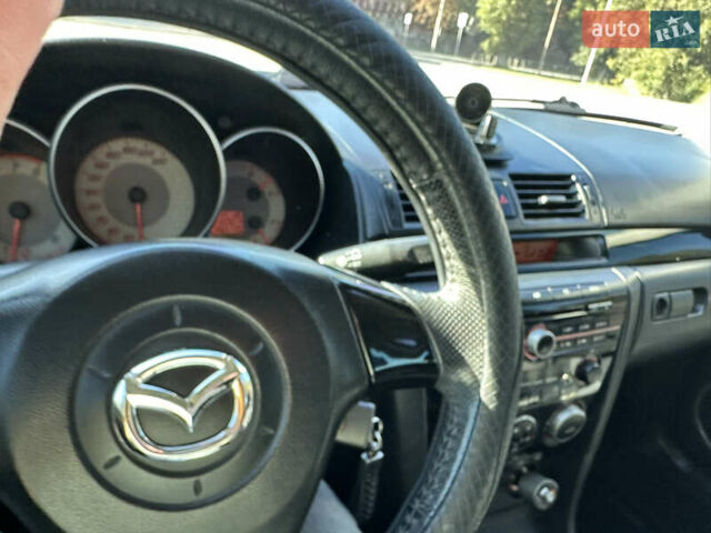 Серый Мазда 3, объемом двигателя 1.6 л и пробегом 198 тыс. км за 5500 $, фото 5 на Automoto.ua