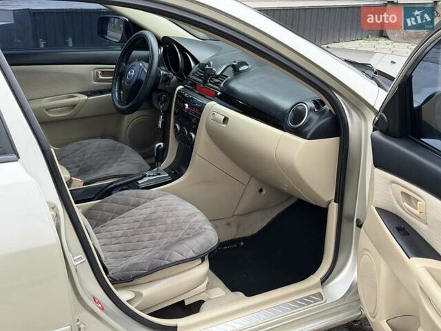 Серый Мазда 3, объемом двигателя 1.6 л и пробегом 170 тыс. км за 6000 $, фото 11 на Automoto.ua