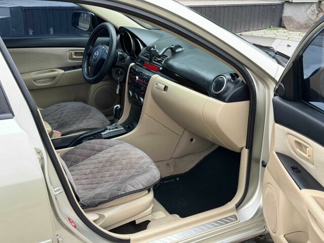 Серый Мазда 3, объемом двигателя 1.6 л и пробегом 170 тыс. км за 6000 $, фото 11 на Automoto.ua