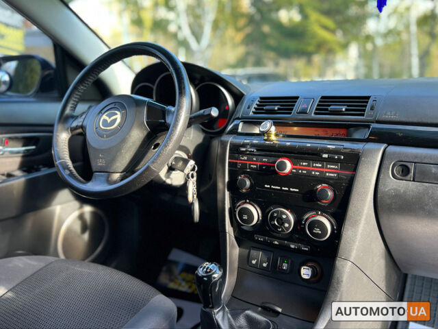 Серый Мазда 3, объемом двигателя 1.6 л и пробегом 147 тыс. км за 5999 $, фото 9 на Automoto.ua
