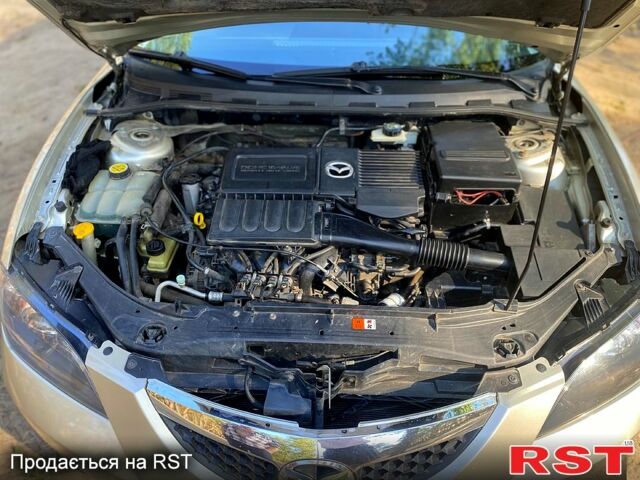 Серый Мазда 3, объемом двигателя 1.6 л и пробегом 249 тыс. км за 4700 $, фото 9 на Automoto.ua