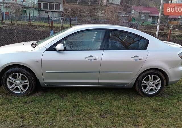 Серый Мазда 3, объемом двигателя 1.6 л и пробегом 282 тыс. км за 5100 $, фото 9 на Automoto.ua