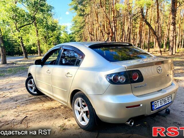 Серый Мазда 3, объемом двигателя 1.6 л и пробегом 249 тыс. км за 4700 $, фото 6 на Automoto.ua