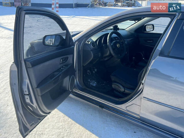 Сірий Мазда 3, об'ємом двигуна 2 л та пробігом 163 тис. км за 4500 $, фото 14 на Automoto.ua