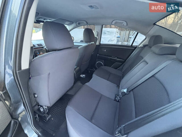 Серый Мазда 3, объемом двигателя 1.6 л и пробегом 226 тыс. км за 3000 $, фото 10 на Automoto.ua