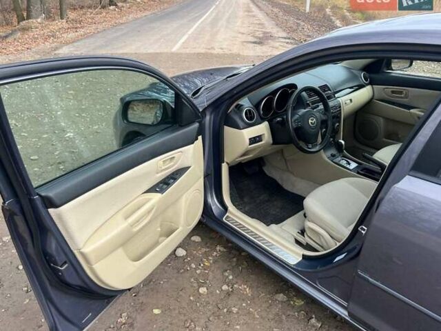 Серый Мазда 3, объемом двигателя 1.6 л и пробегом 178 тыс. км за 6250 $, фото 27 на Automoto.ua