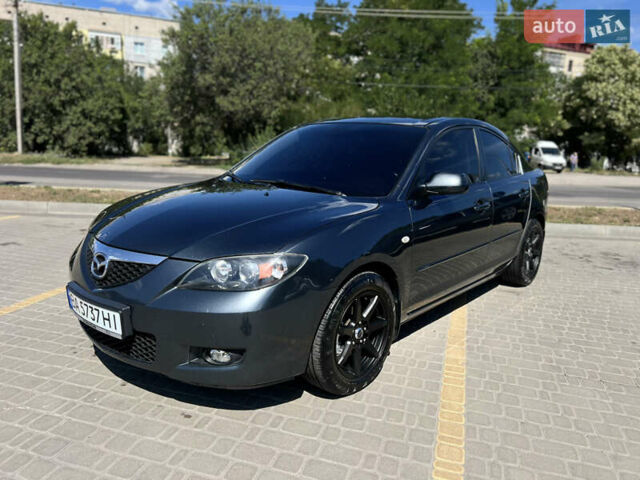 Серый Мазда 3, объемом двигателя 1.6 л и пробегом 246 тыс. км за 6400 $, фото 1 на Automoto.ua